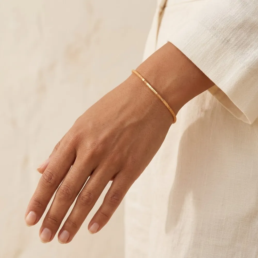 Delica Topaz Gold Bracelet