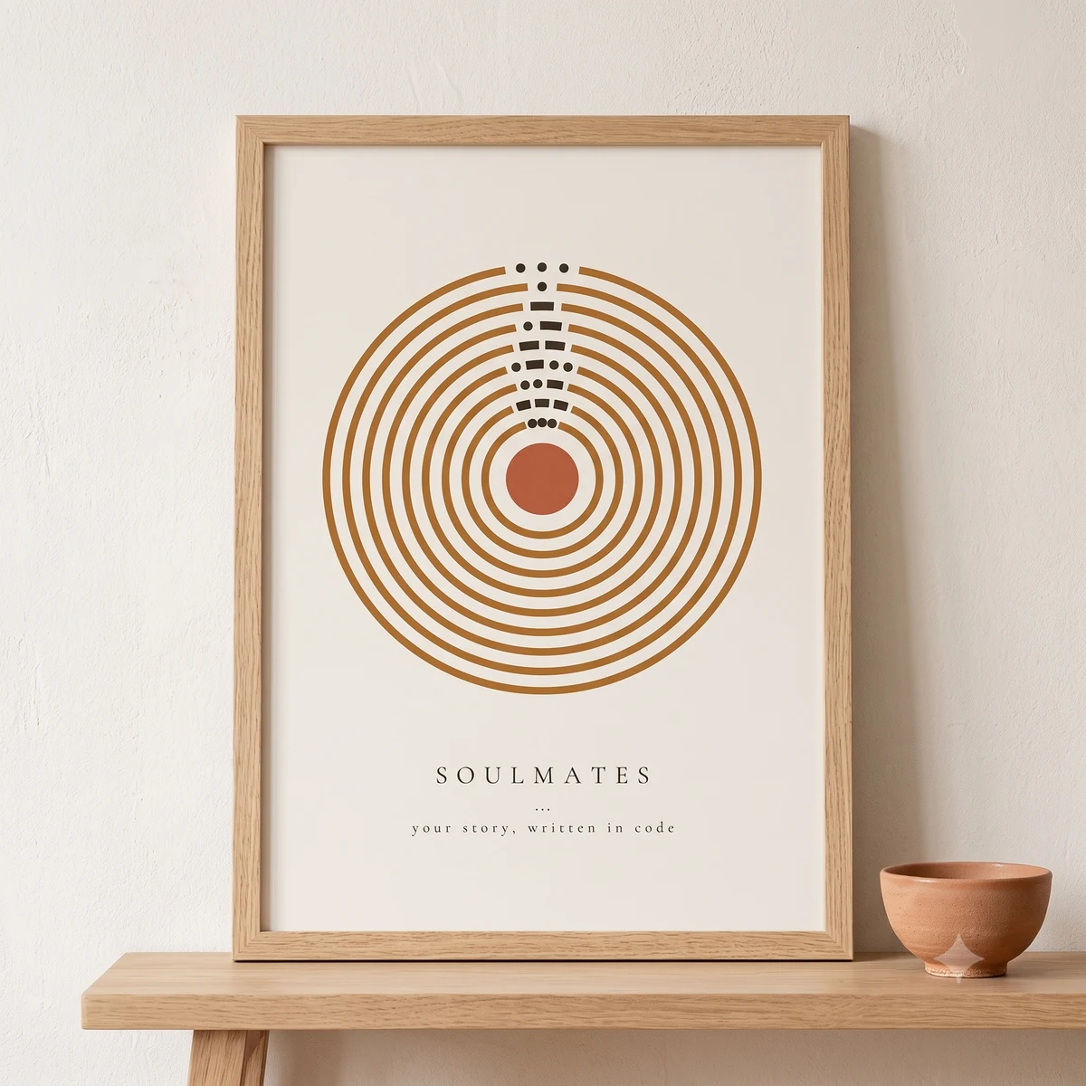 Rings Morse code print in a natural wood frame, styled on a shelf